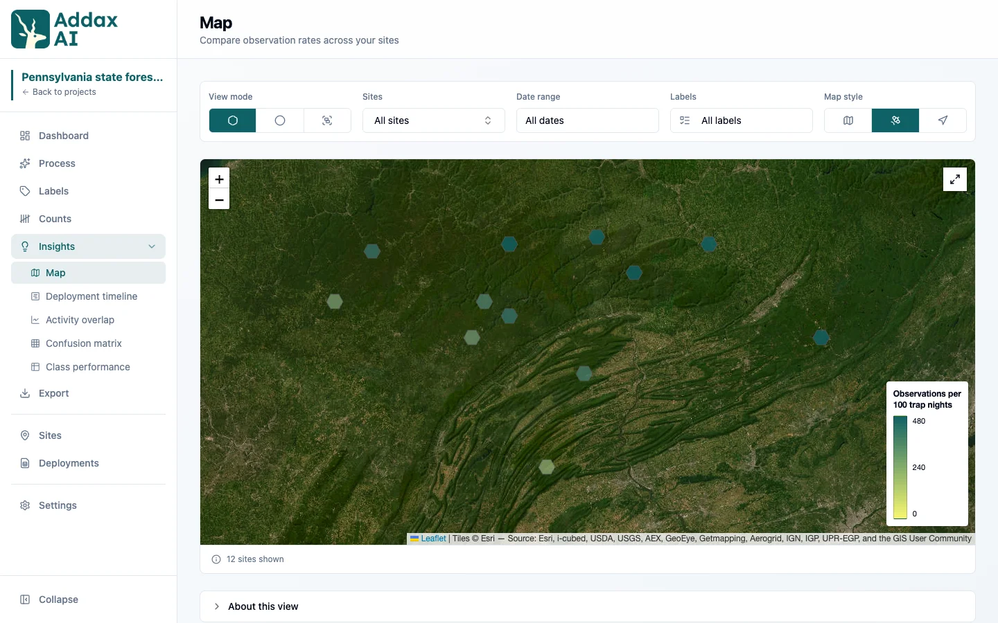The same site map on satellite imagery, showing forest cover and terrain